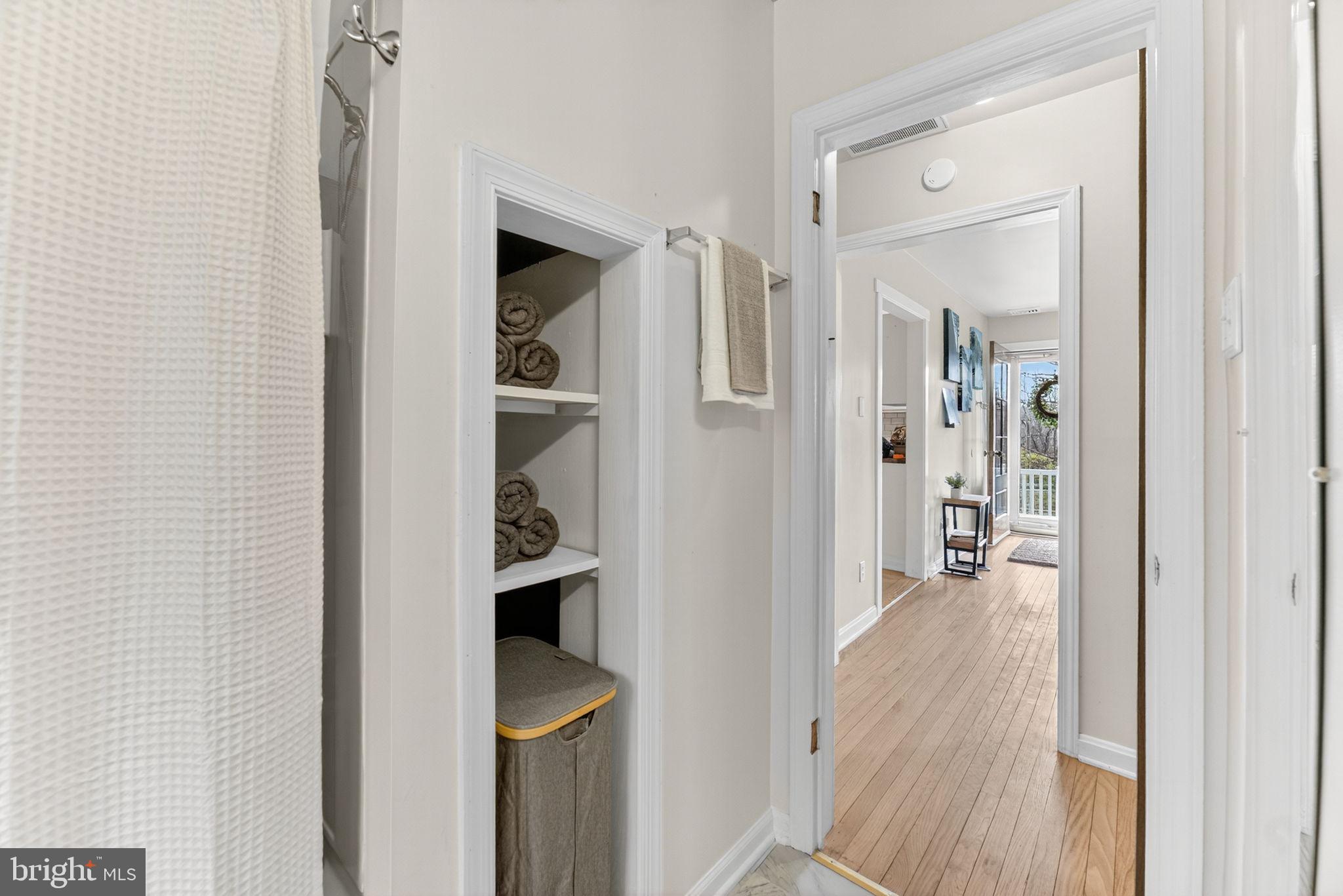 616 Bondsville Road Downingtown, PA 19335 - Photo 31 of 43 a view of a hallway with wooden floor and staircase