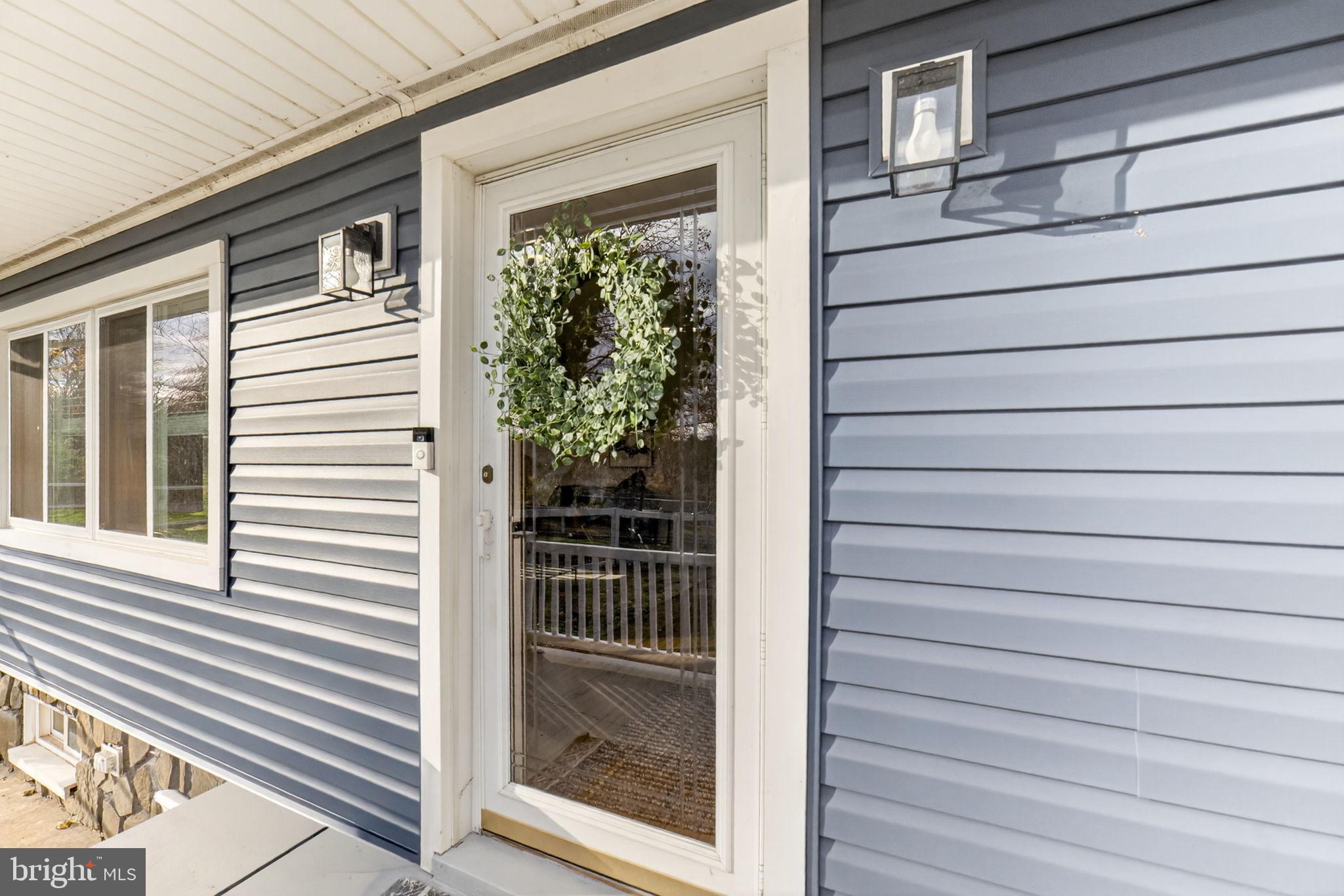 616 Bondsville Road Downingtown, PA 19335 - Photo 8 of 43 a view of a door and a window
