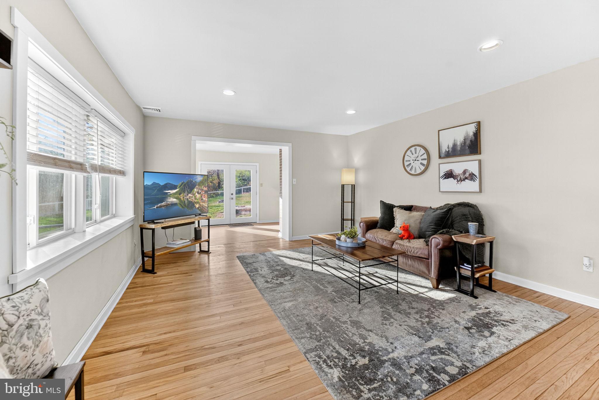 616 Bondsville Road Downingtown, PA 19335 - Photo 9 of 43 a living room with furniture and wooden floor