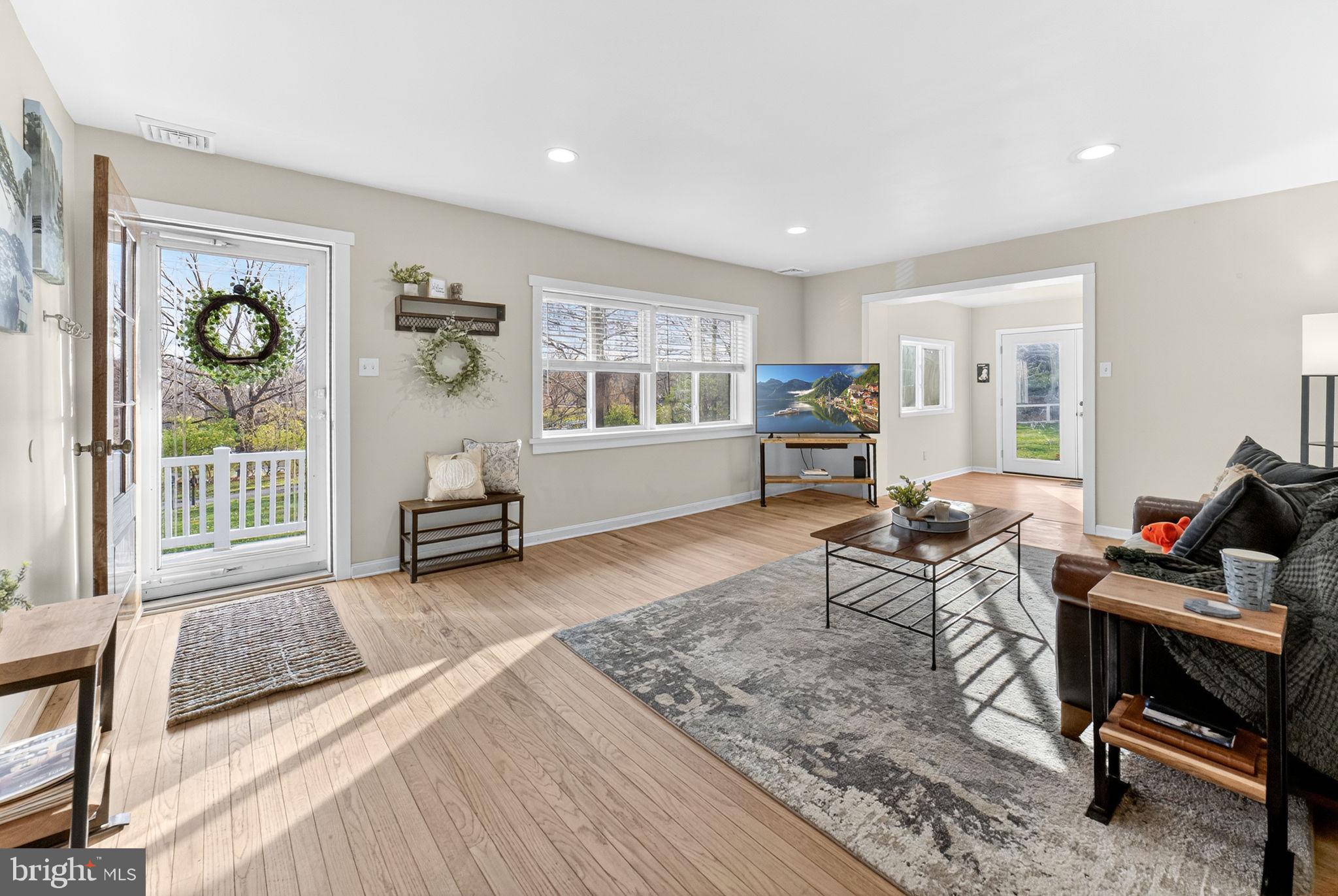 616 Bondsville Road Downingtown, PA 19335 - Photo 10 of 43 a living room with furniture and wooden floor