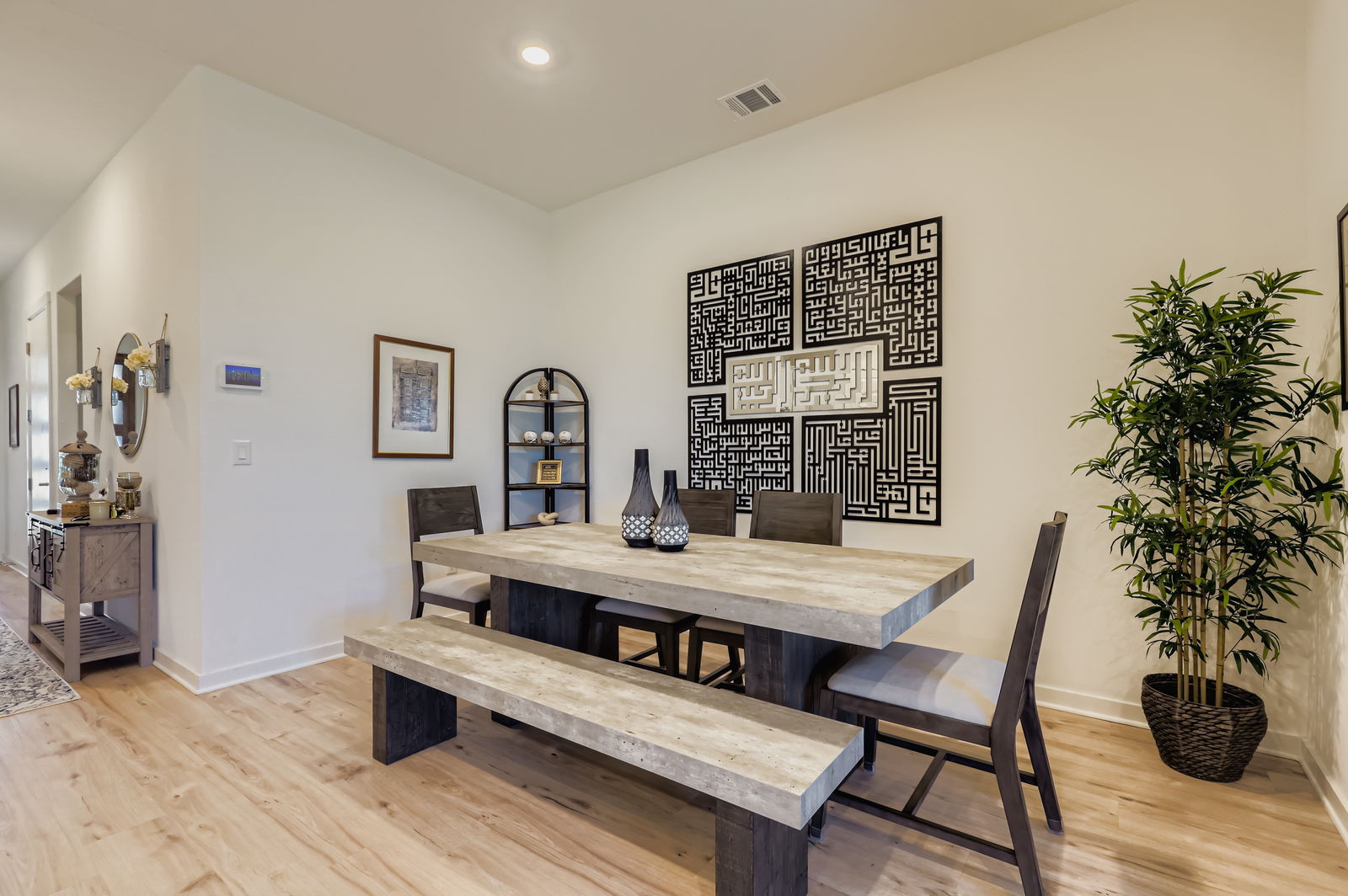 1909 Ruger Pass Leander, TX 78641 - Photo 10 of 31 Dining area featuring light wood-style floors and recessed lighting