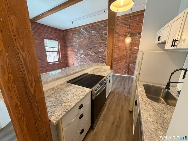 a view of a kitchen from a sink