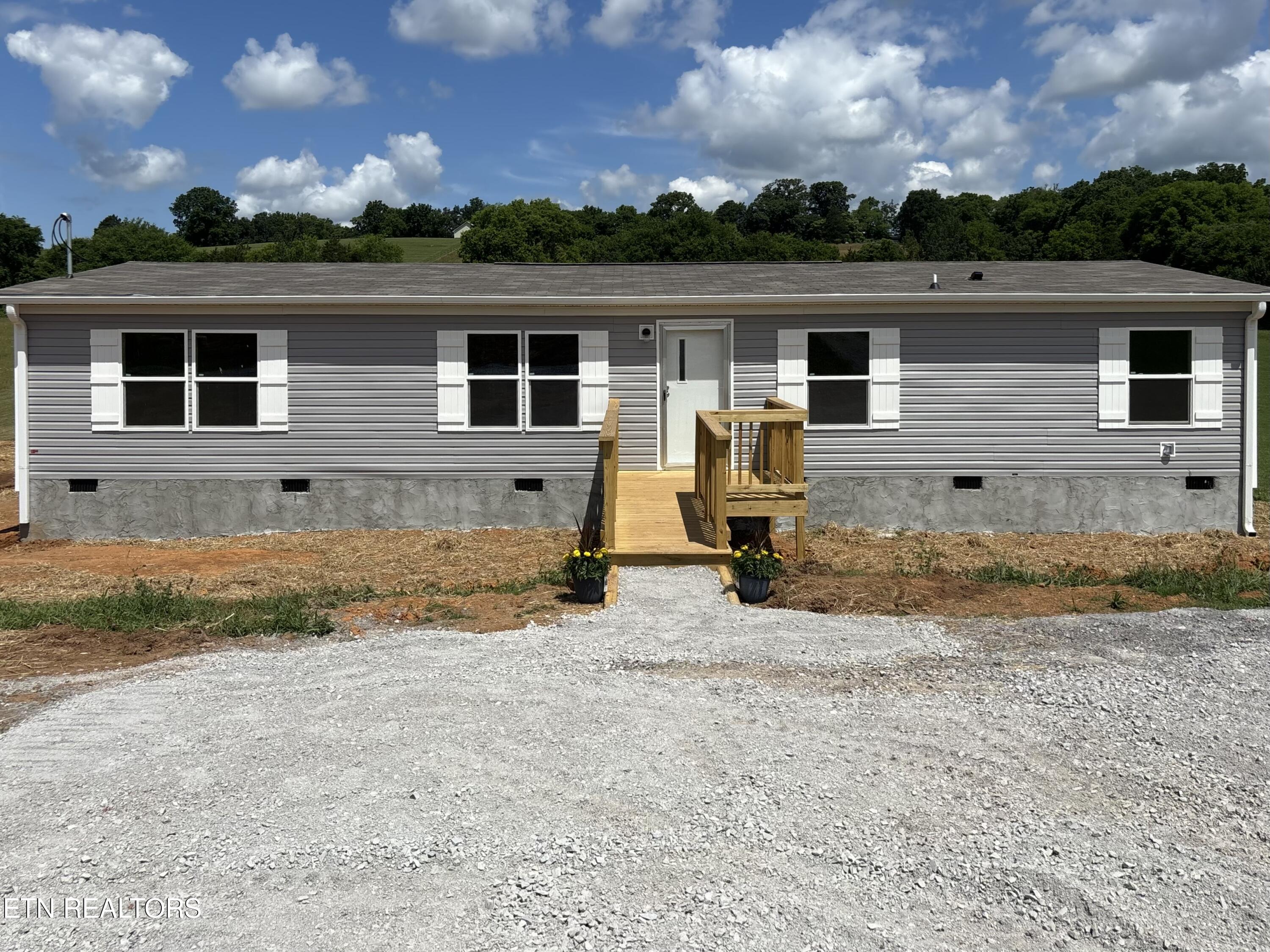 281 Thompson Road Madisonville, TN 37354 - Photo 1 of 13 80305900982__9BCD43CC-F025-4A29-AAA5-DB2