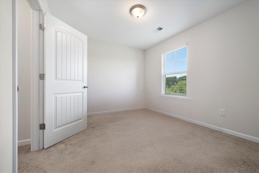 117 Adger Road Pendleton, SC 29670 - Photo 25 of 36 This bright, empty room offers a blank canvas for personalization and peaceful relaxation.