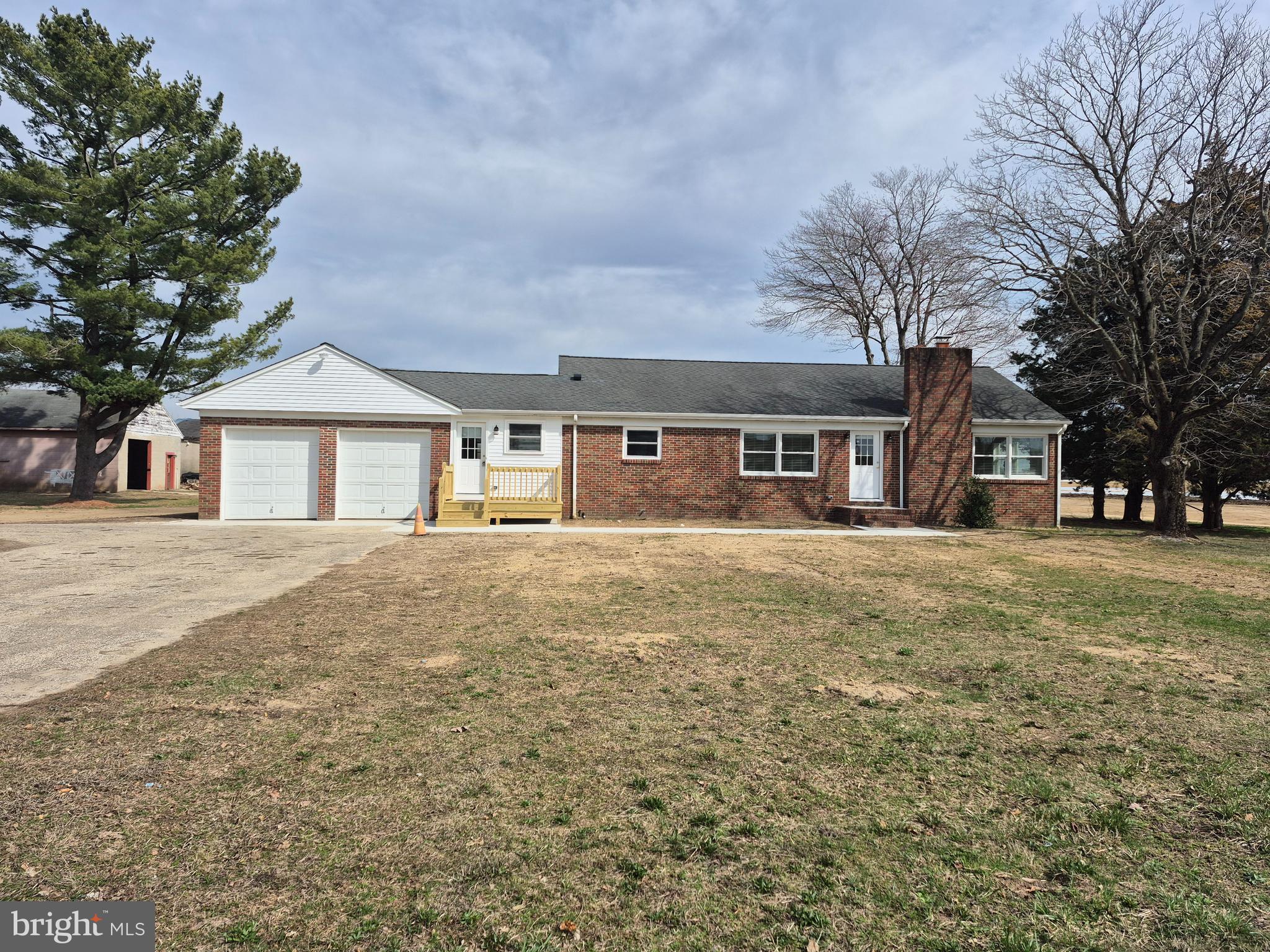 1705 South Central Avenue Vineland, NJ 08360 - Photo 1 of 23 a front view of a house with a yard