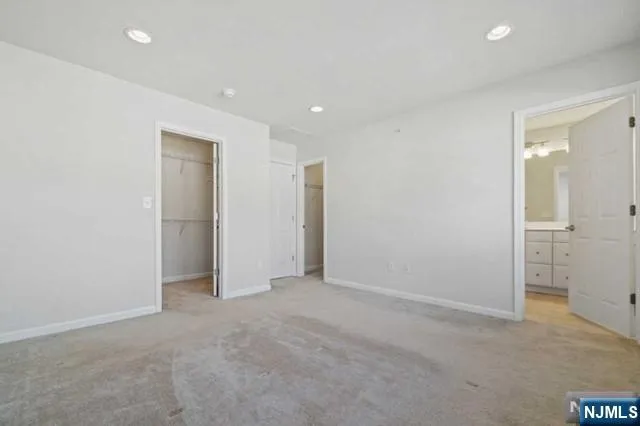 an empty room with a bathroom