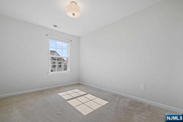 32 Truman Drive Wood-Ridge, NJ 07075 - Photo 33 of 49 an empty room with windows