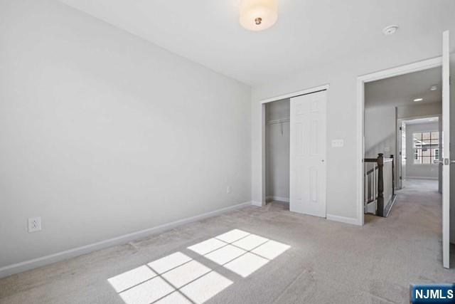 32 Truman Drive Wood-Ridge, NJ 07075 - Photo 34 of 49 an empty room with windows