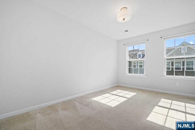 32 Truman Drive Wood-Ridge, NJ 07075 - Photo 35 of 49 an empty room with windows