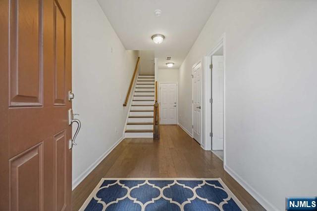 32 Truman Drive Wood-Ridge, NJ 07075 - Photo 5 of 49 a view of hallway with stairs