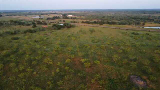a view of a lake from a yard