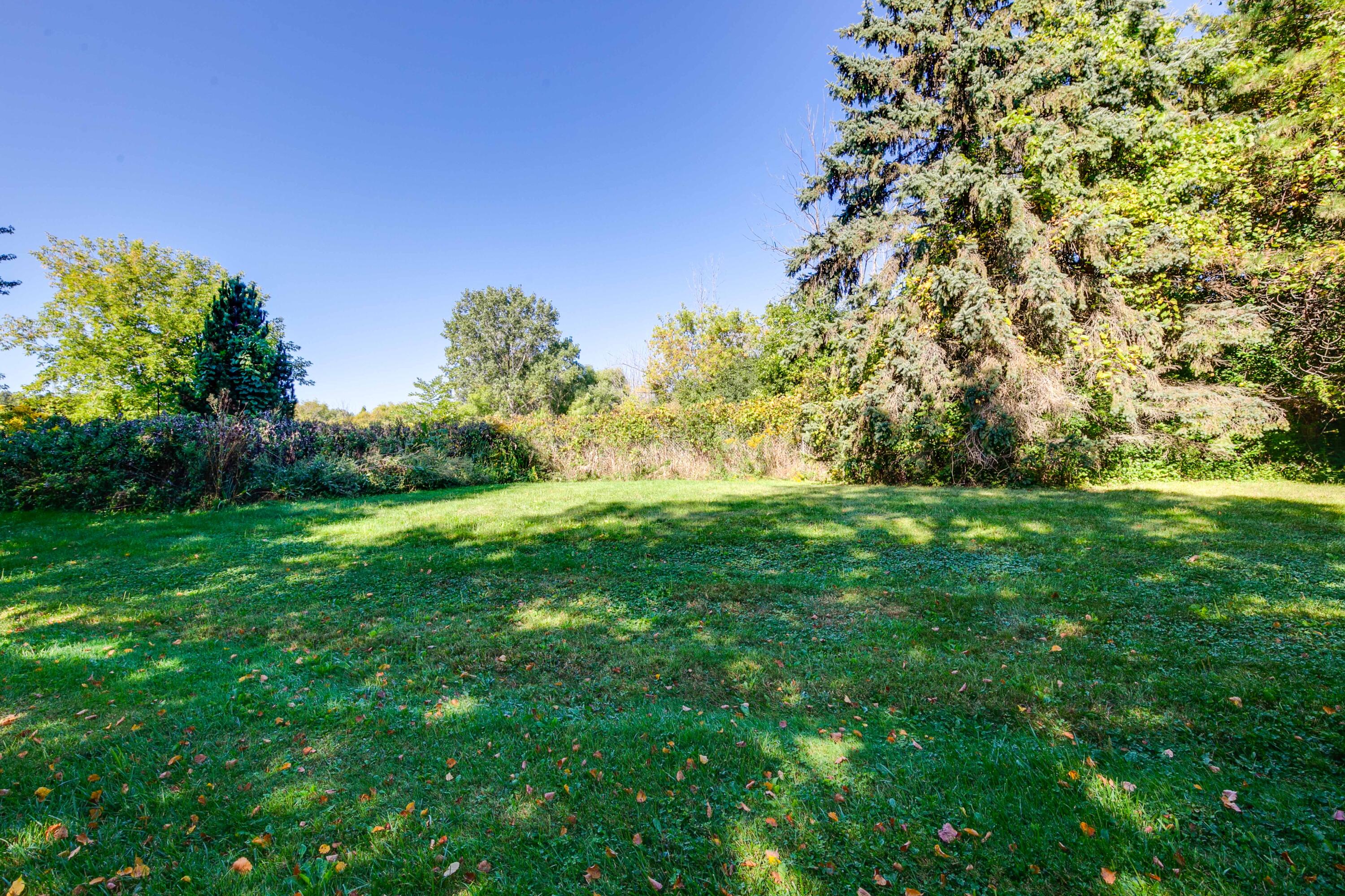3810 Wyoming Way, Unit 2 Caledonia, WI 53404 - Photo 23 of 29 Backyard Common Space