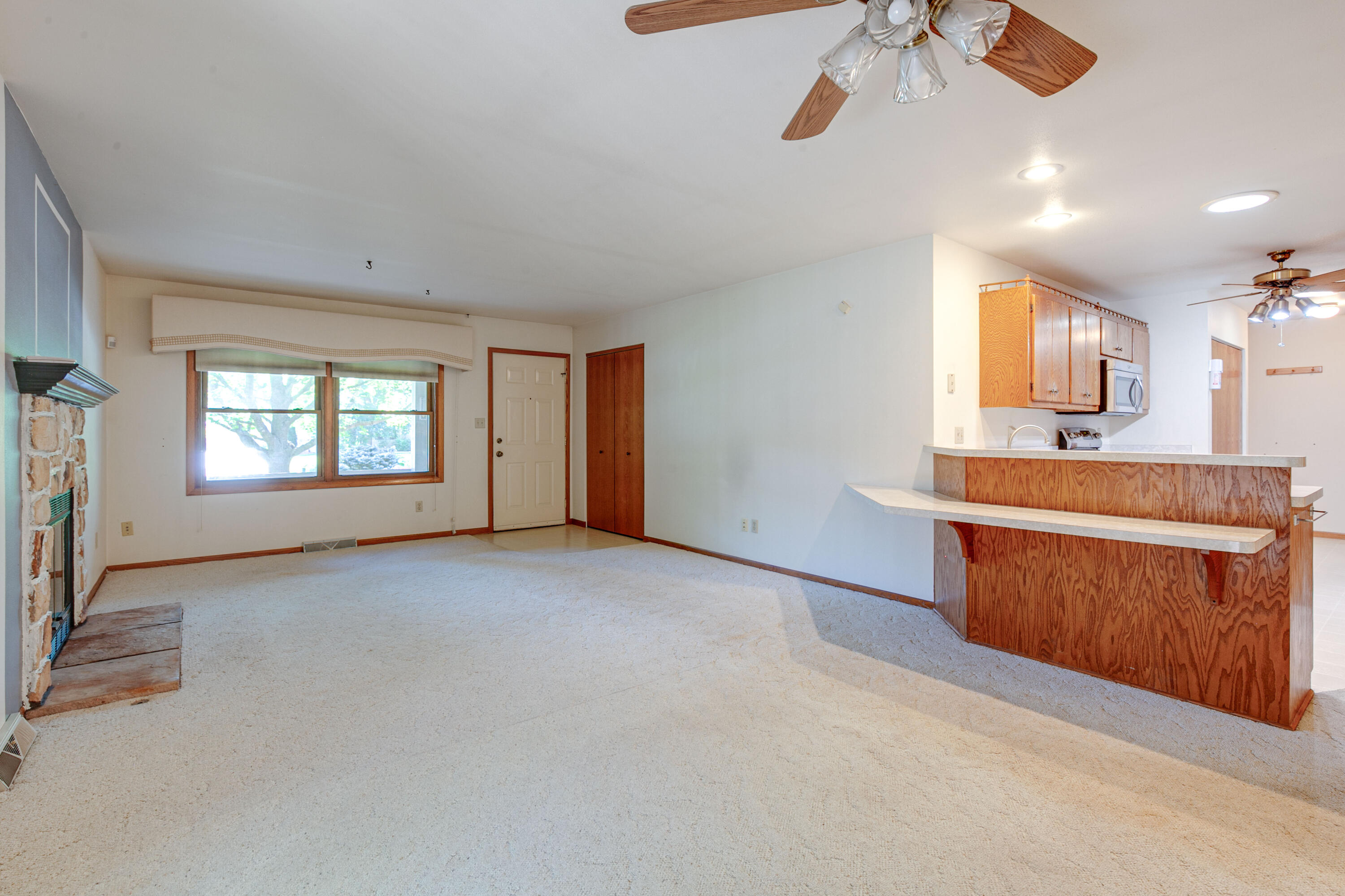 3810 Wyoming Way, Unit 2 Caledonia, WI 53404 - Photo 9 of 29 Front Door View with Kitchen