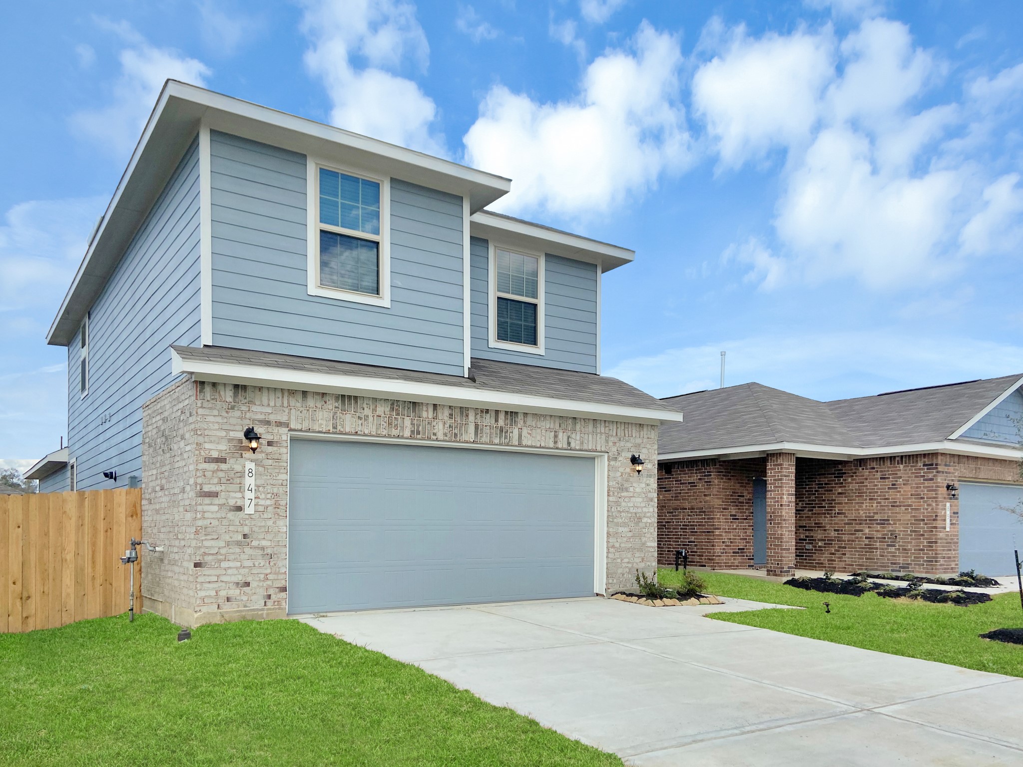 847 Redinger Ridge Drive Huffman, TX 77336 - Photo 2 of 30 front view of a house with a yard