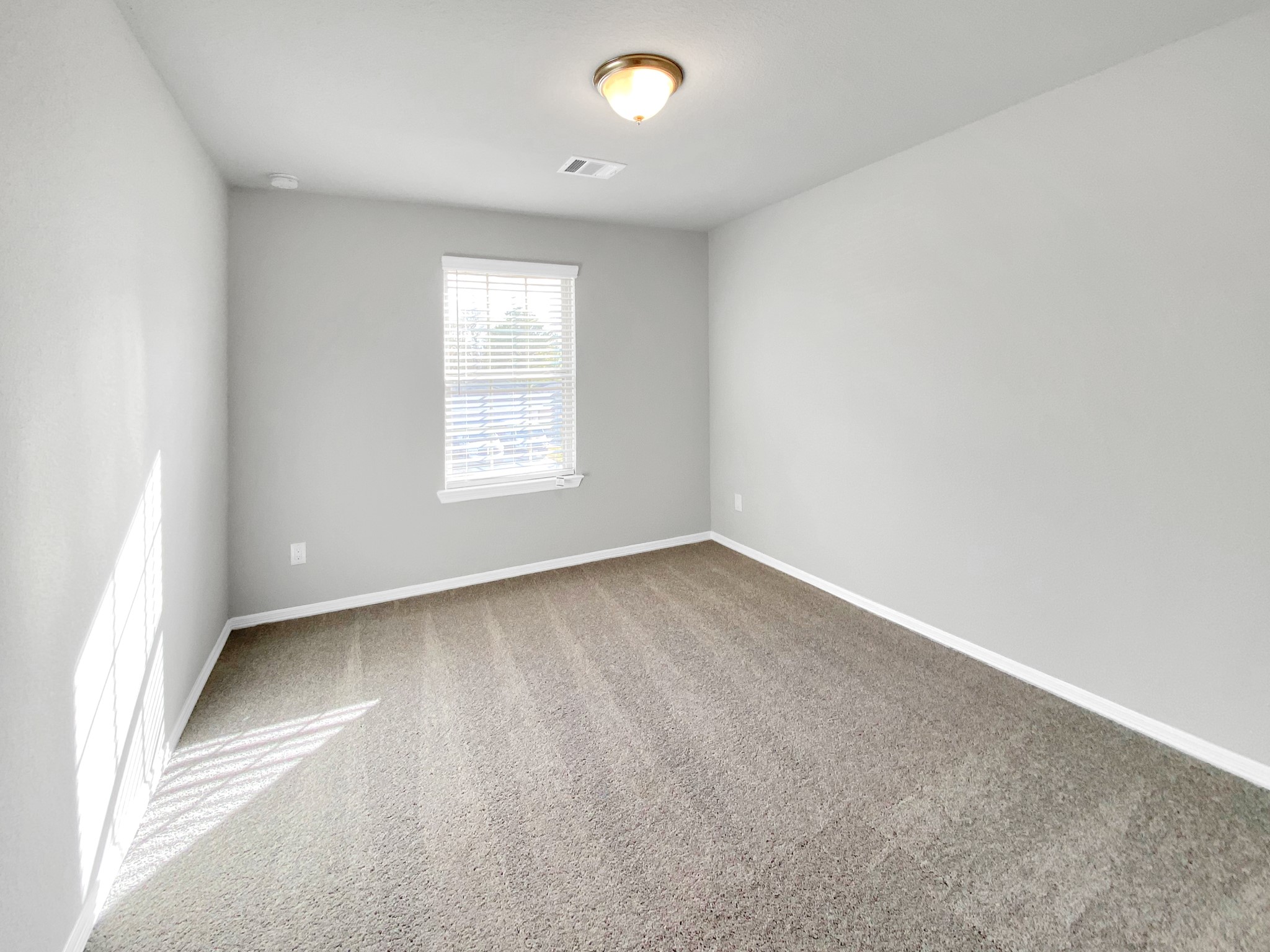 847 Redinger Ridge Drive Huffman, TX 77336 - Photo 26 of 30 an empty room with a window
