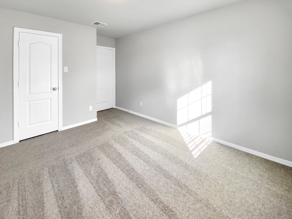 847 Redinger Ridge Drive Huffman, TX 77336 - Photo 27 of 30 a view of an empty room and a window