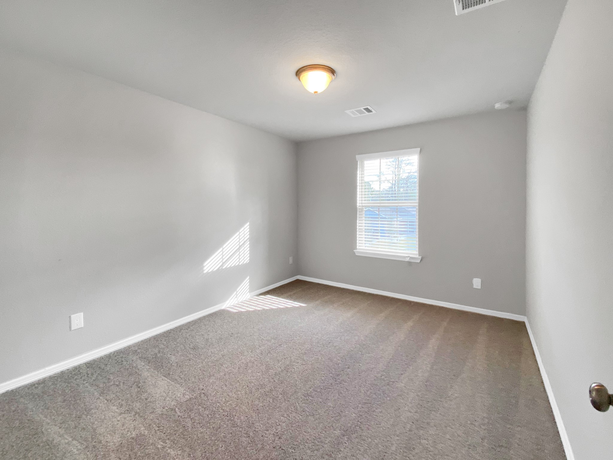 847 Redinger Ridge Drive Huffman, TX 77336 - Photo 28 of 30 a view of an empty room with a window