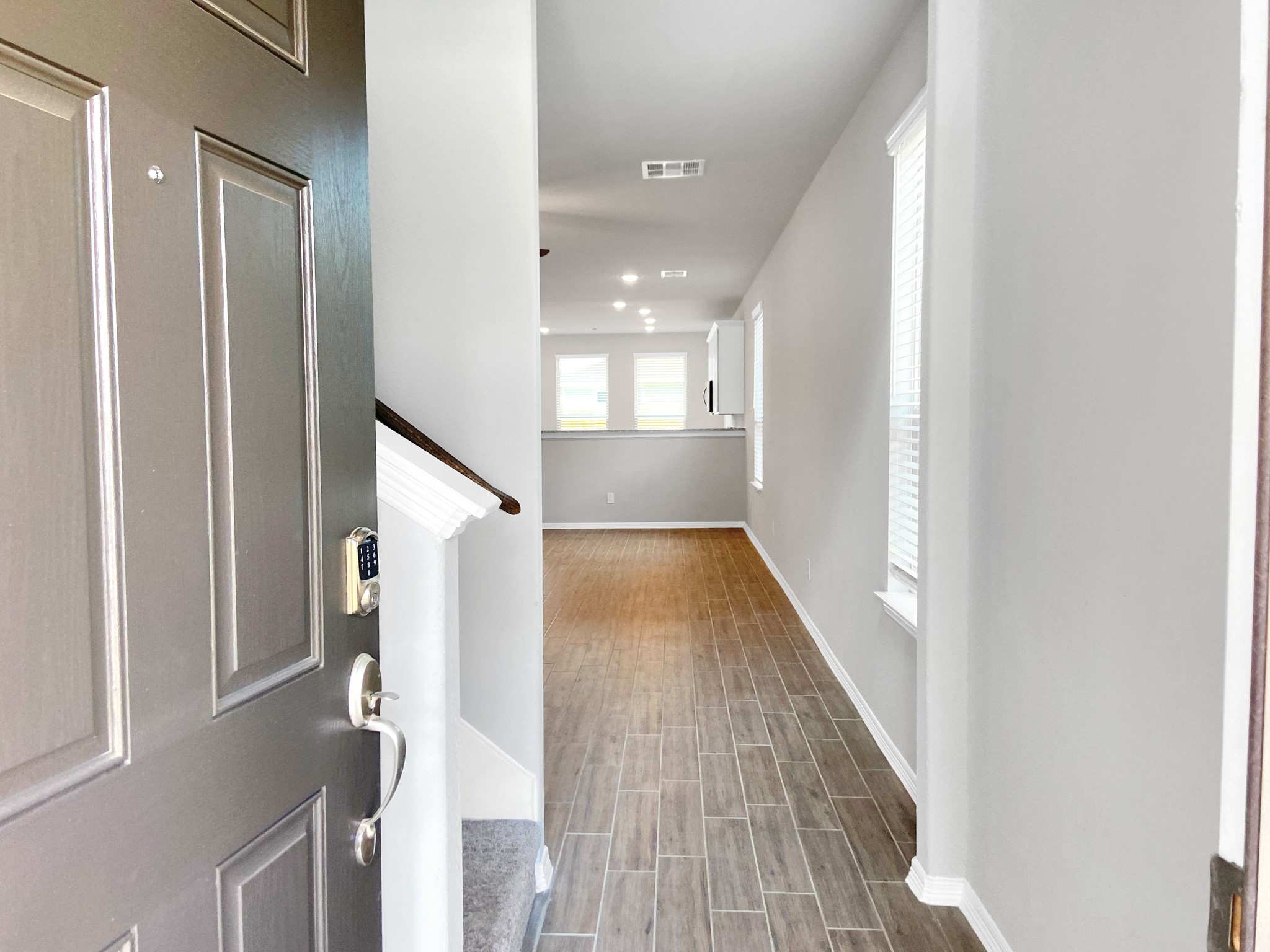 847 Redinger Ridge Drive Huffman, TX 77336 - Photo 5 of 30 a view of entryway with wooden floor
