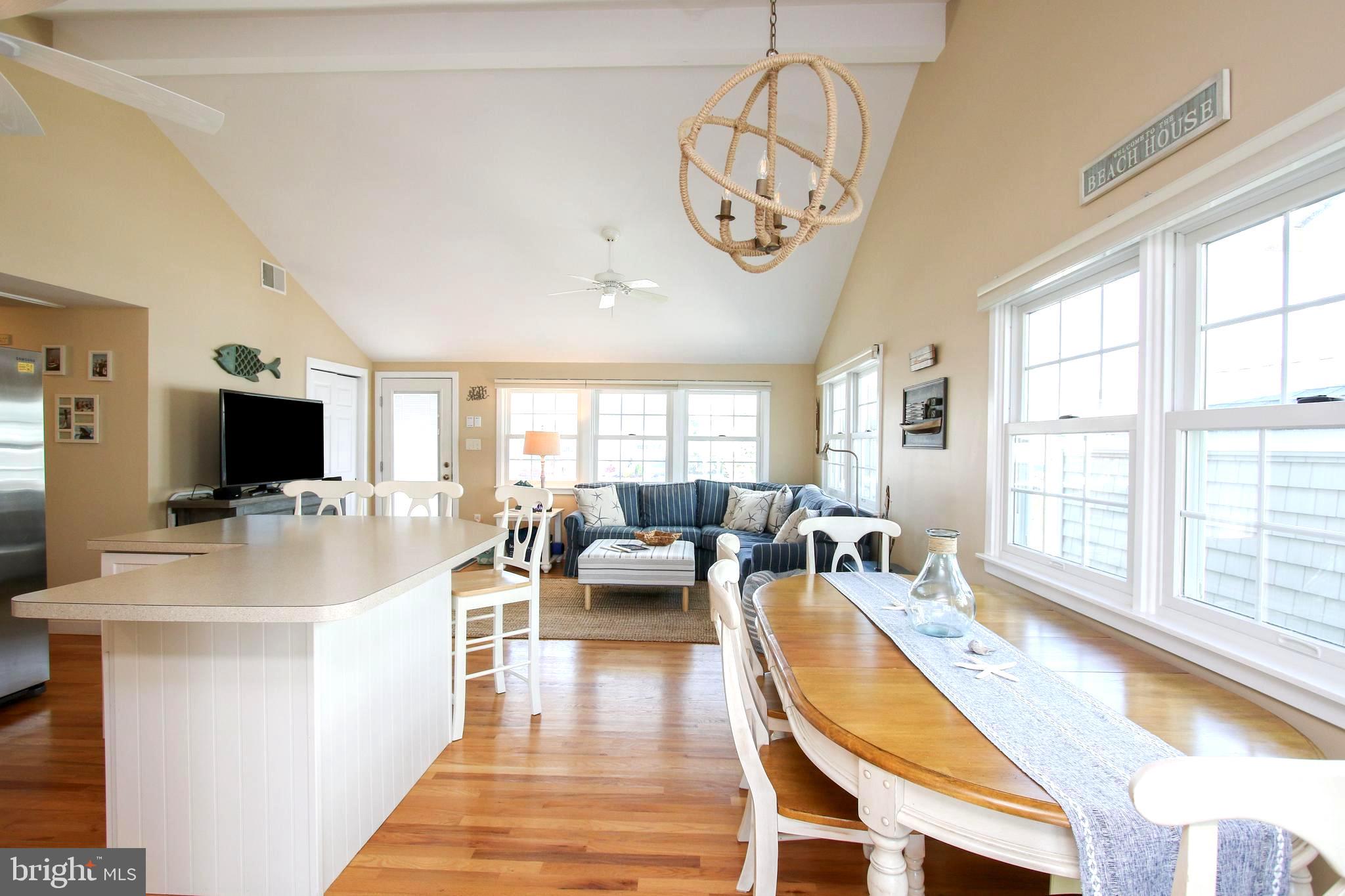29 Alma Road Long Beach Township, NJ 08006 - Photo 19 of 43 large family dining with extra child's bench