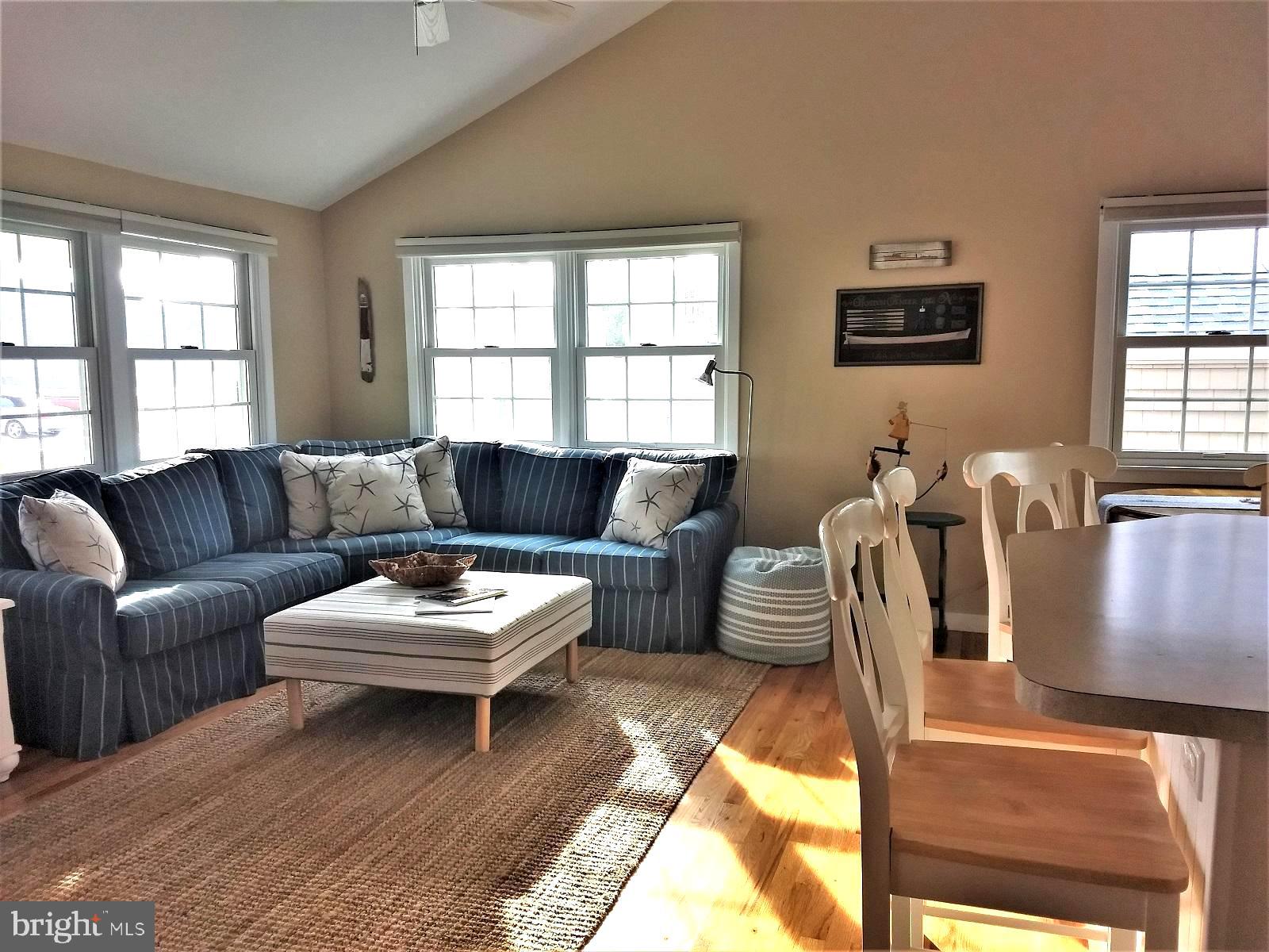 29 Alma Road Long Beach Township, NJ 08006 - Photo 20 of 43 kick back living room with large screen TV