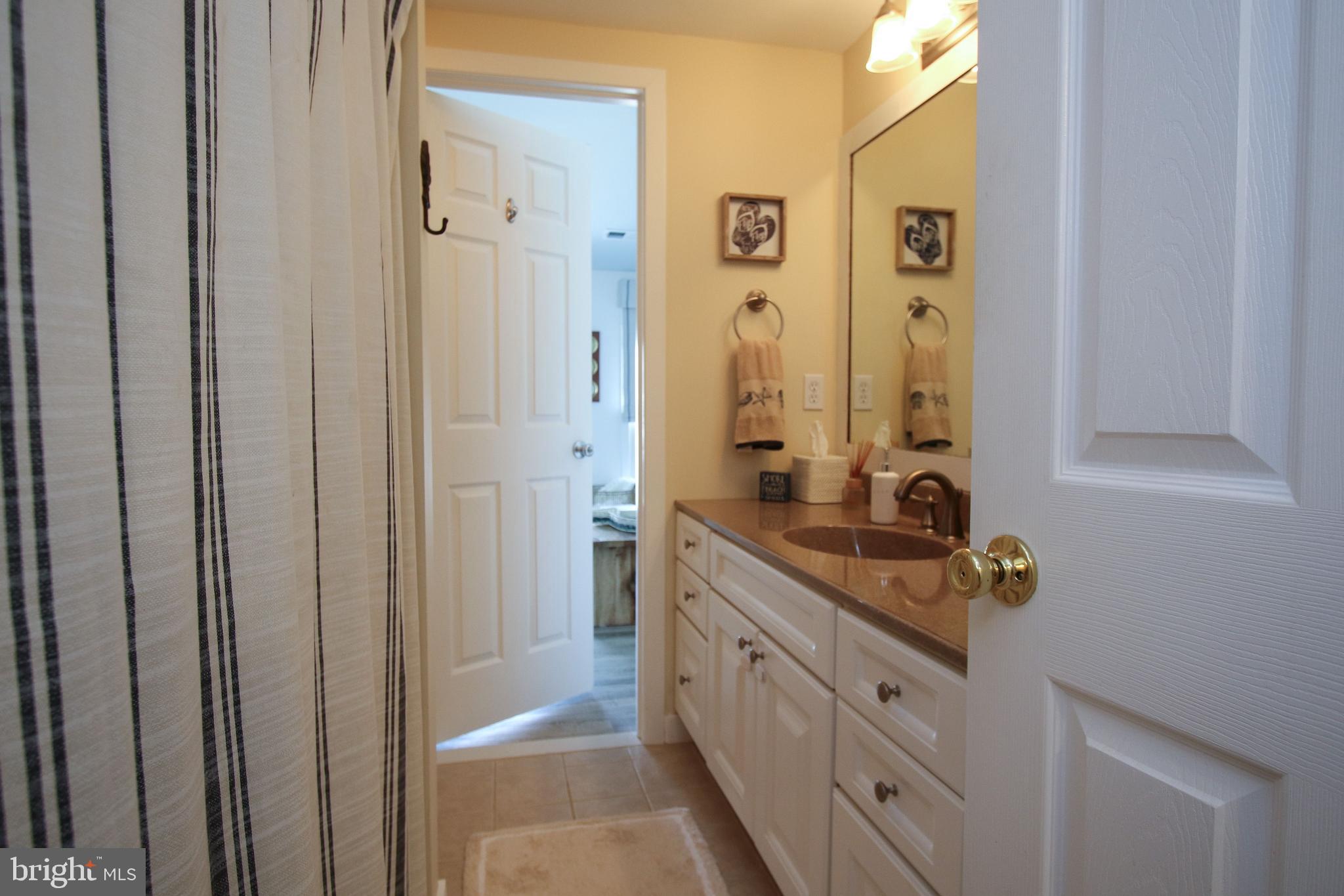 29 Alma Road Long Beach Township, NJ 08006 - Photo 26 of 43 full bath opens to office or 4th bedroom