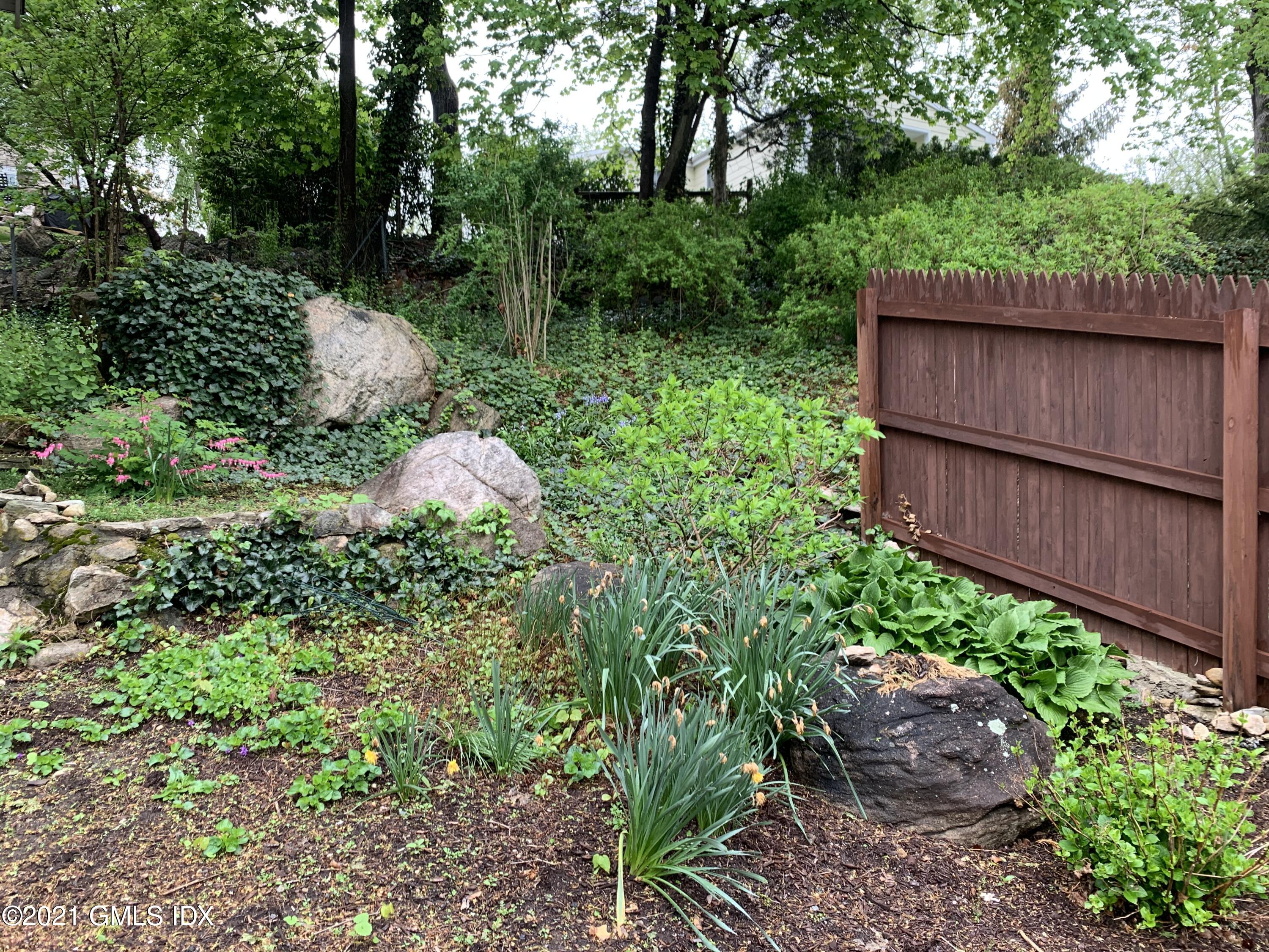 34 Sinawoy Road Cos Cob, CT 06807 - Photo 16 of 16 a view of backyard with wooden fence