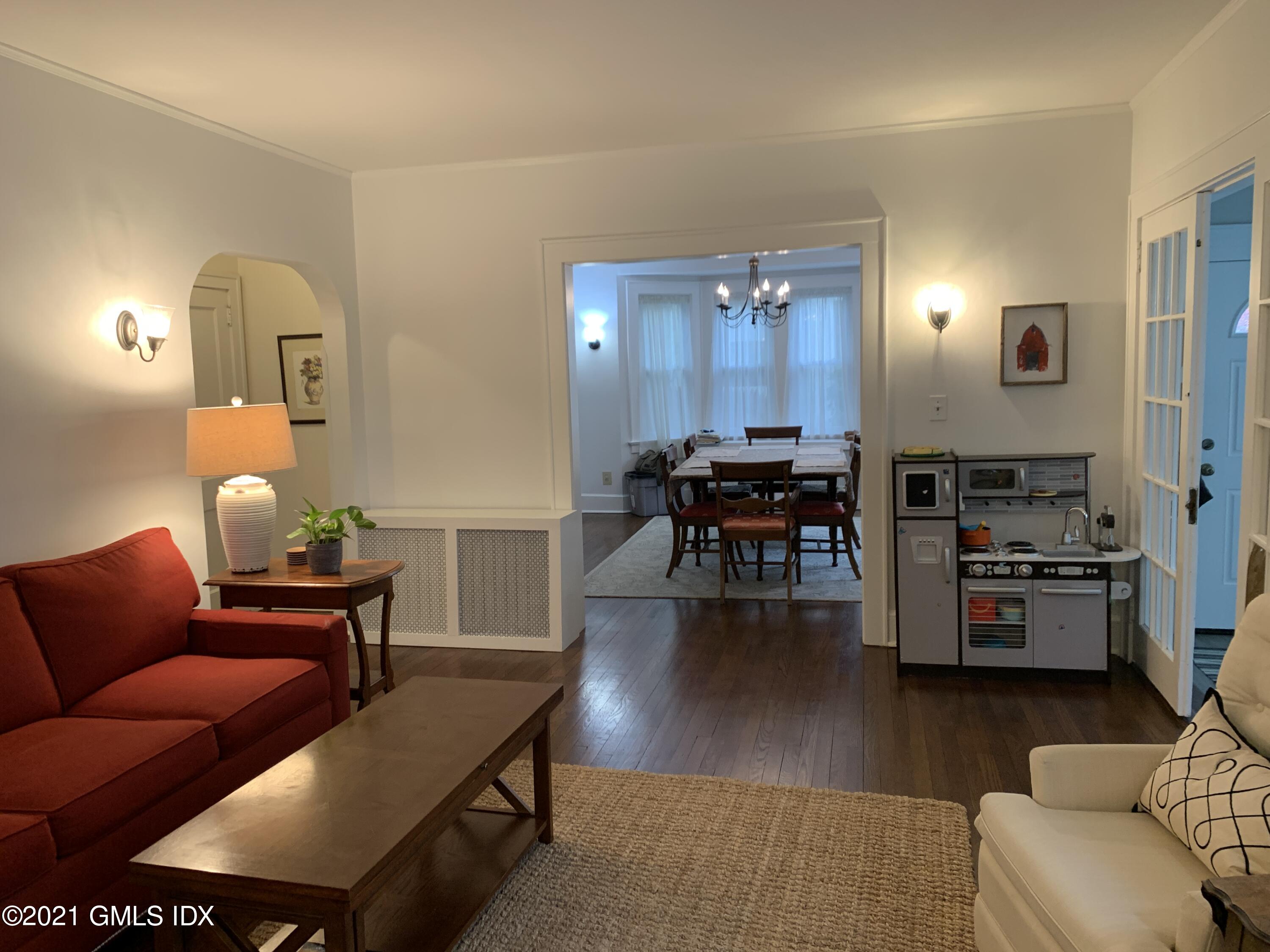 34 Sinawoy Road Cos Cob, CT 06807 - Photo 6 of 16 a living room with furniture and wooden floor
