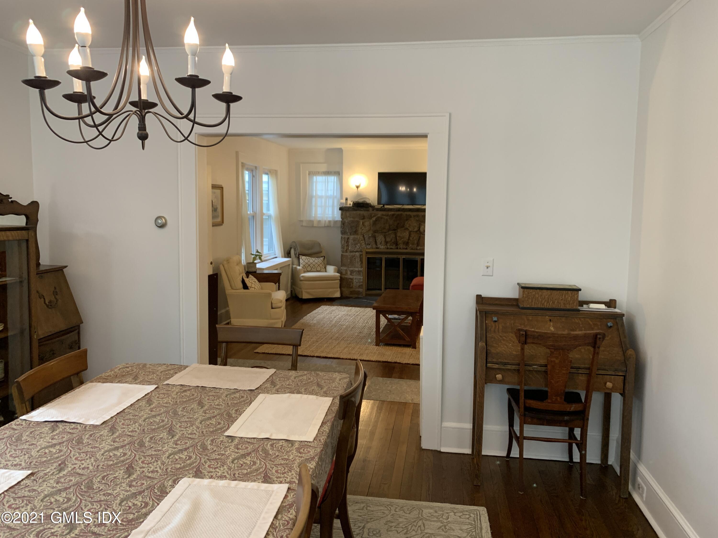 34 Sinawoy Road Cos Cob, CT 06807 - Photo 7 of 16 a bedroom with a bed and furniture