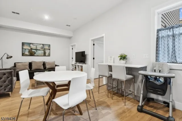 a view of a dining room with furniture