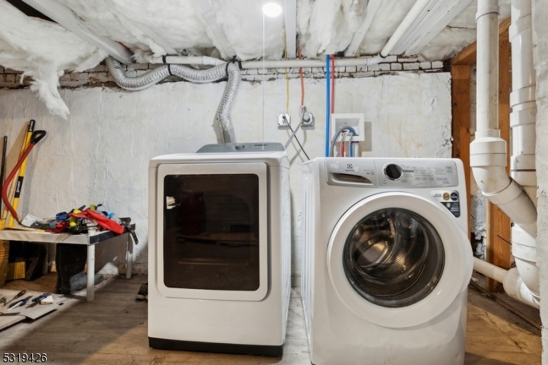 104 Fleming Avenue, Unit 201 Newark, NJ 07105 - Photo 26 of 33 a utility room with dryer and washer