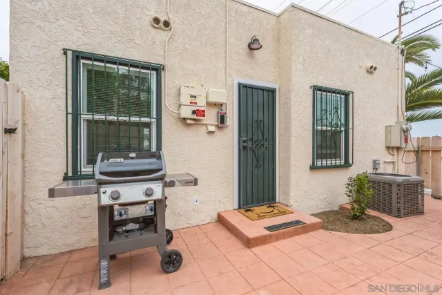a dining room with a table and chairs