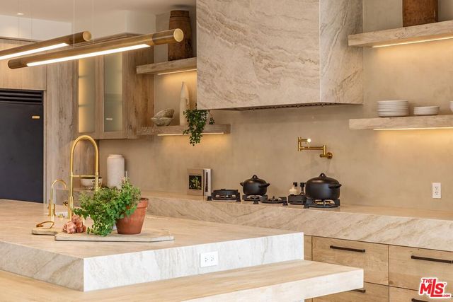 a dining area with furniture and outdoor view