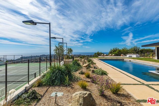 a view of a living room and front door