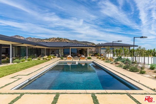 a view of a balcony with city view
