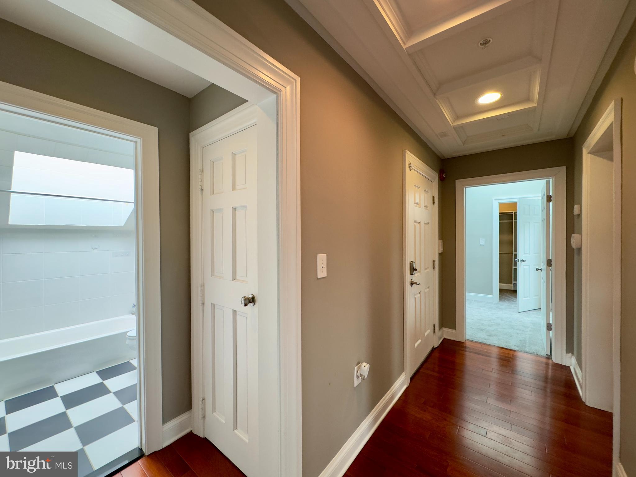 803 Cathedral Street, Unit 9 Baltimore, MD 21201 - Photo 2 of 14 a view of a hallway with wooden floor