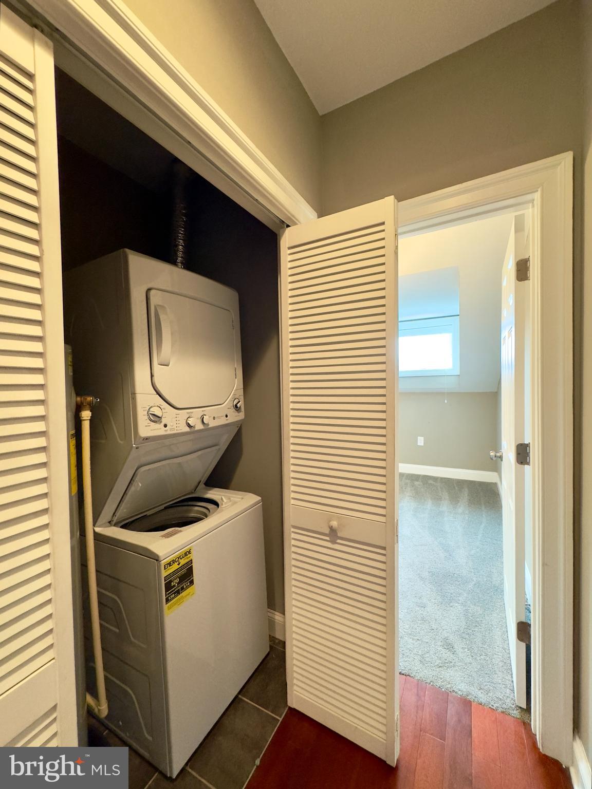 803 Cathedral Street, Unit 9 Baltimore, MD 21201 - Photo 4 of 14 a utility room with washer and dryer