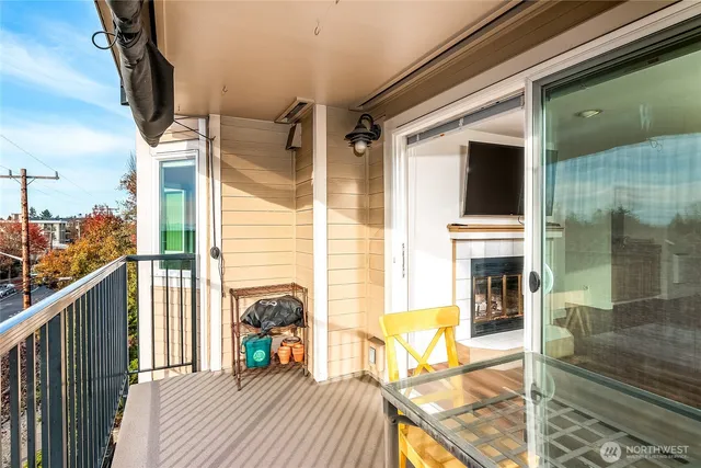 a view of a balcony with furniture