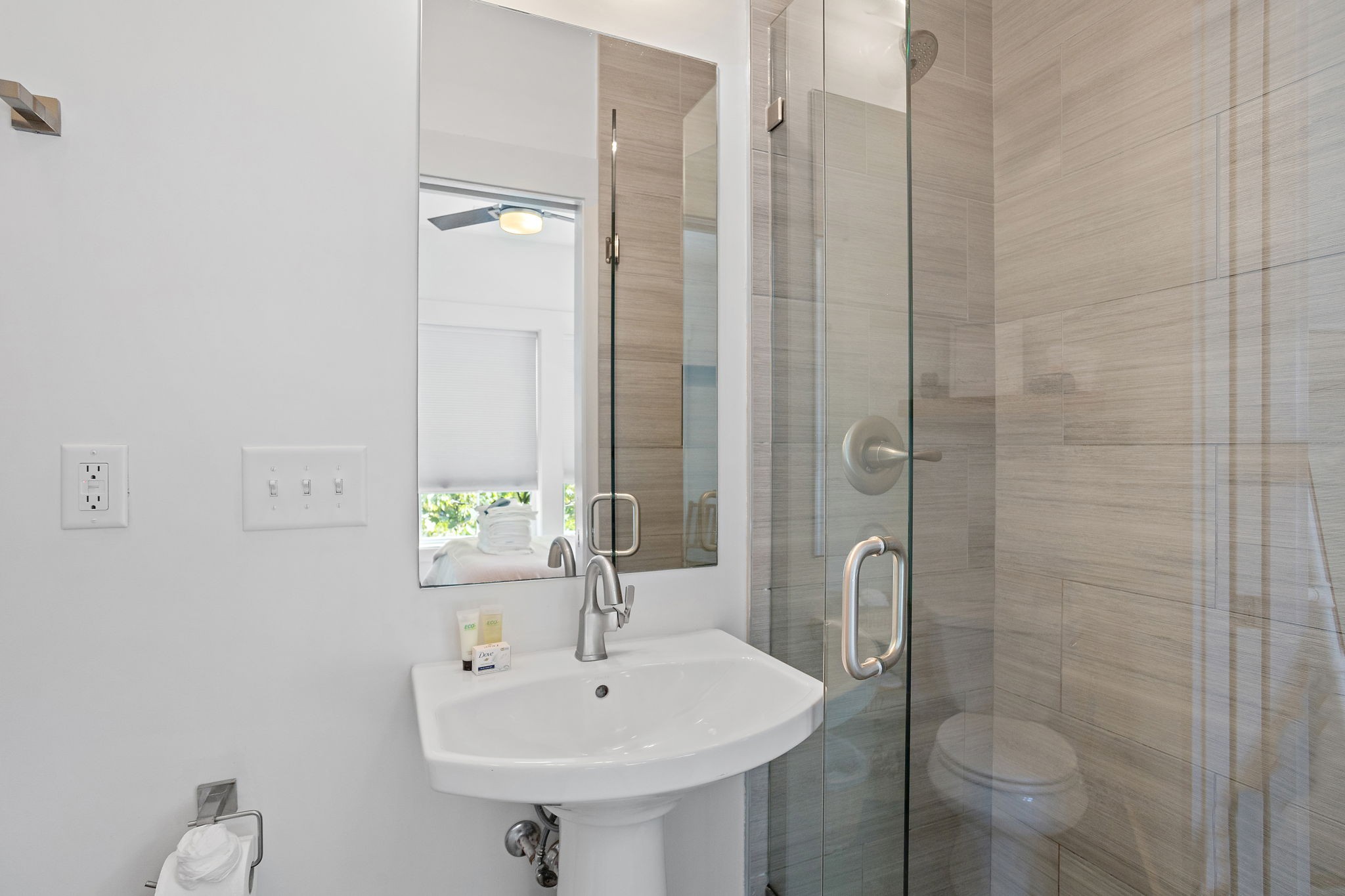 1027 East Trinity Lane, Unit 5 Nashville, TN 37216 - Photo 20 of 34 a bathroom with a sink a toilet and shower