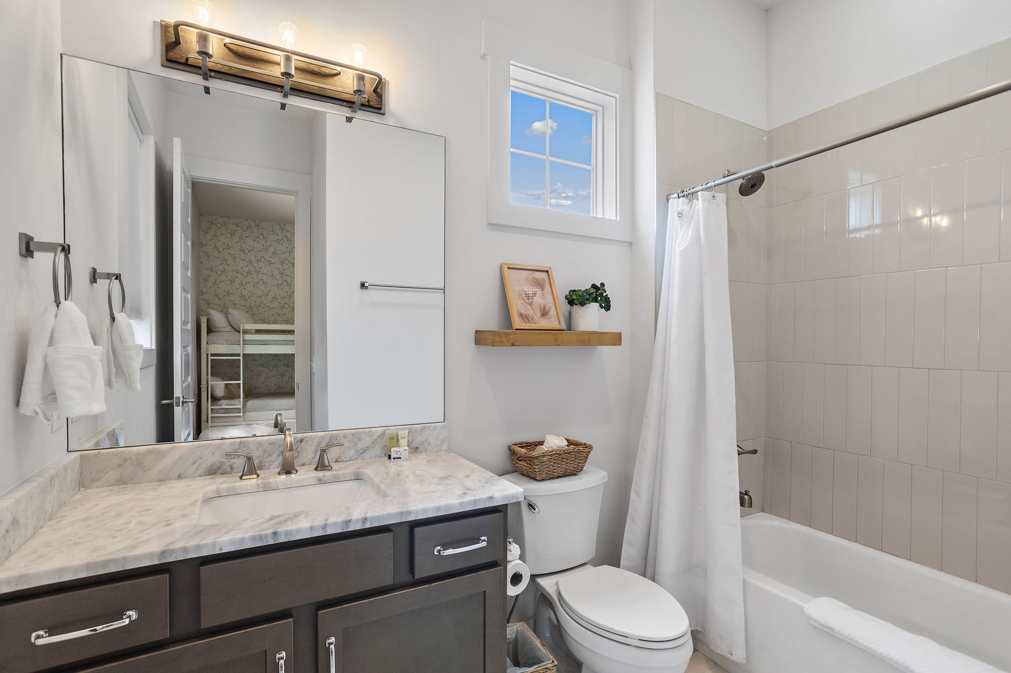 1027 East Trinity Lane, Unit 5 Nashville, TN 37216 - Photo 23 of 34 a bathroom with a granite countertop sink toilet and shower