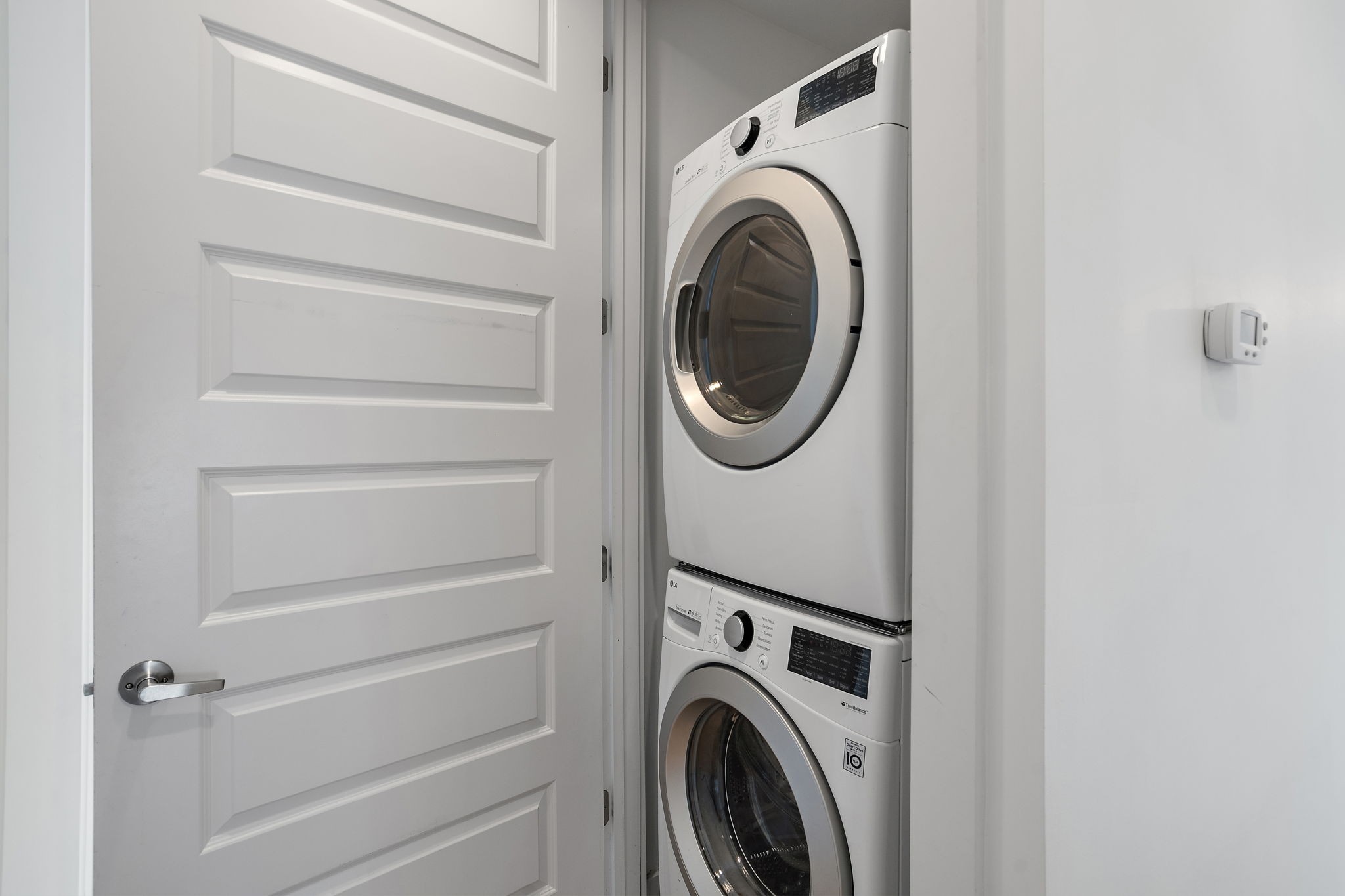 1027 East Trinity Lane, Unit 5 Nashville, TN 37216 - Photo 31 of 34 a utility room with dryer and washer