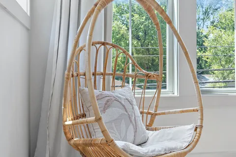 a view of balcony with furniture