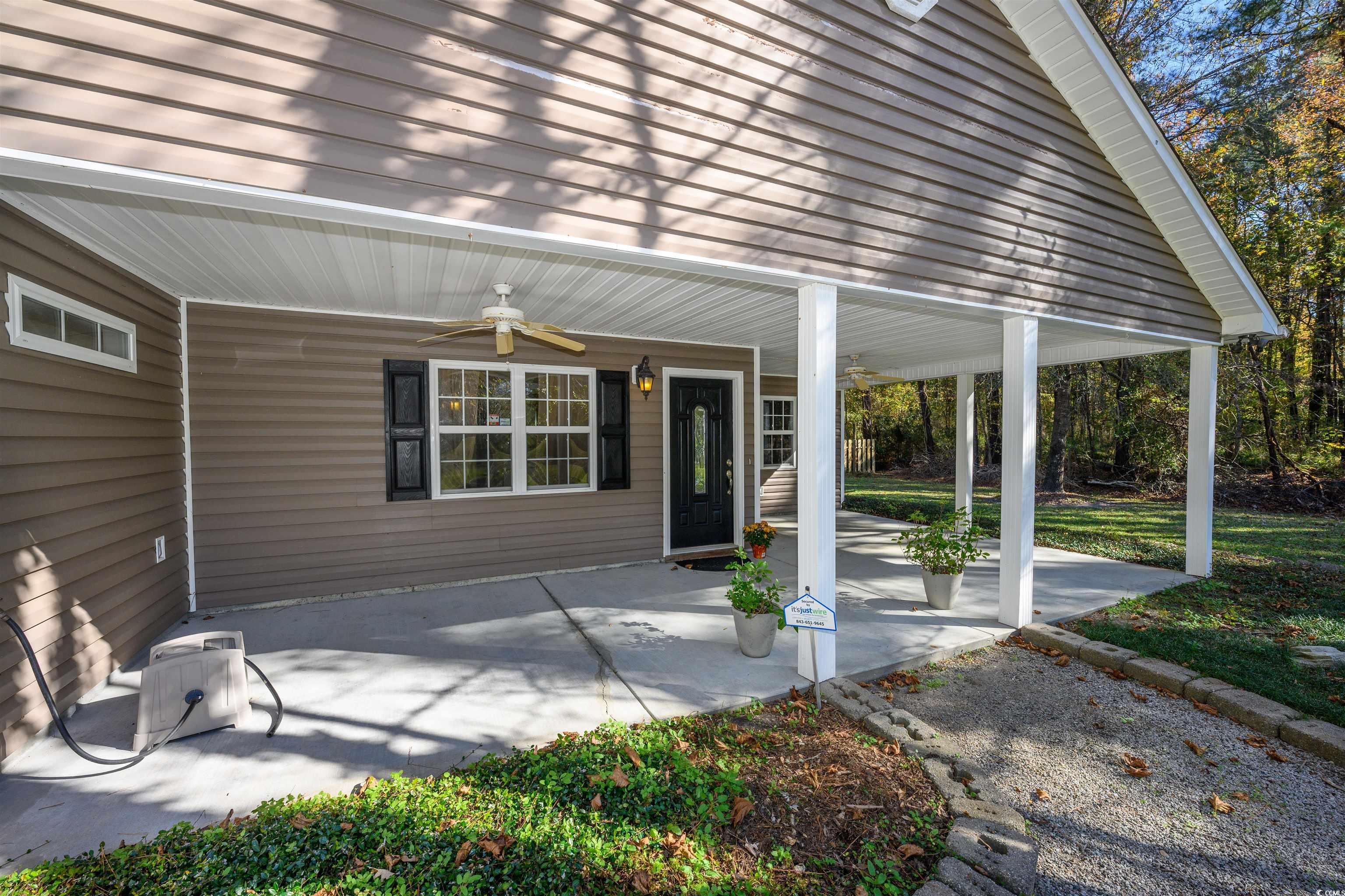 6252 Salem Road Myrtle Beach, SC 29588 - Photo 14 of 39 View of patio featuring ceiling fan