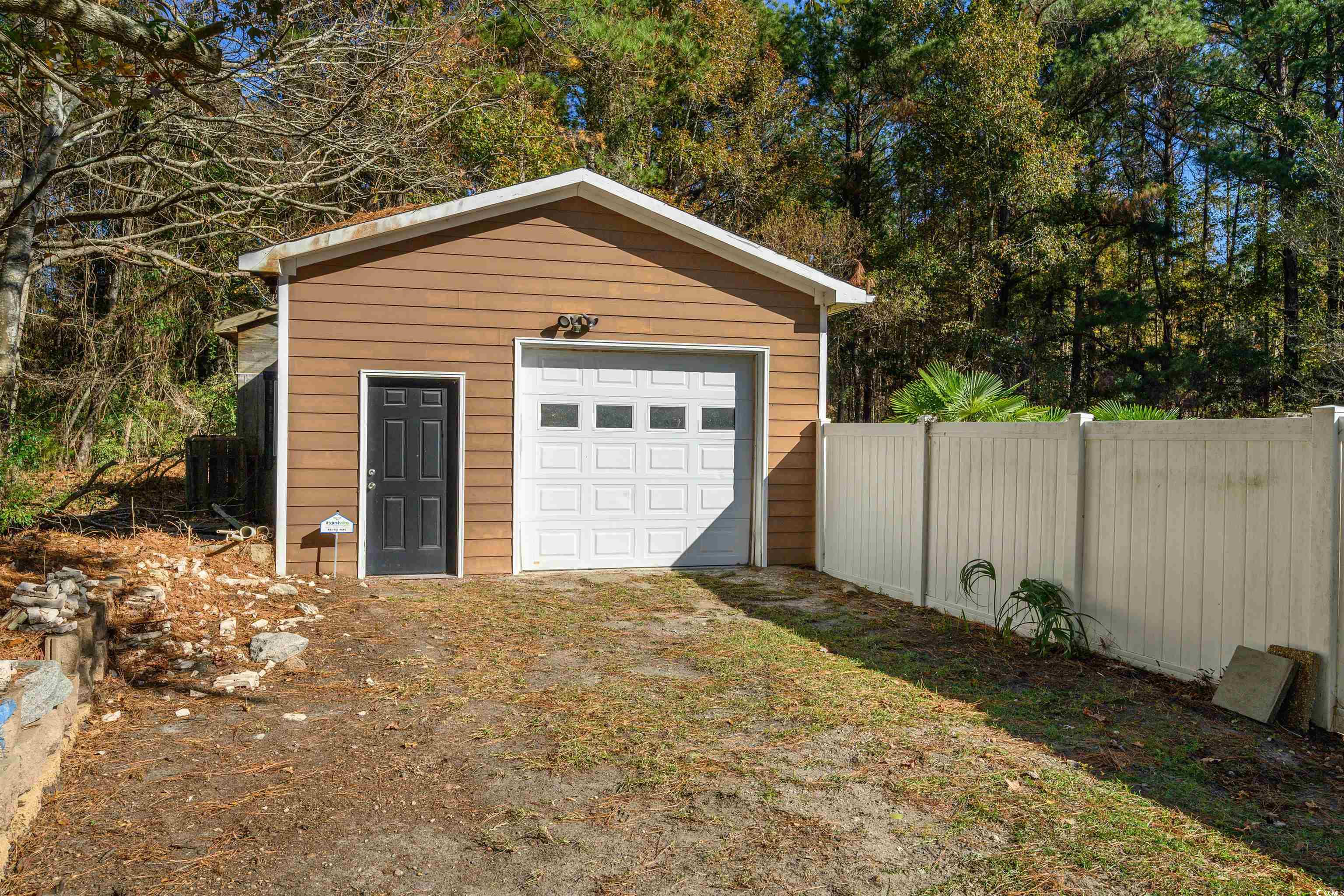 6252 Salem Road Myrtle Beach, SC 29588 - Photo 22 of 39 View of garage