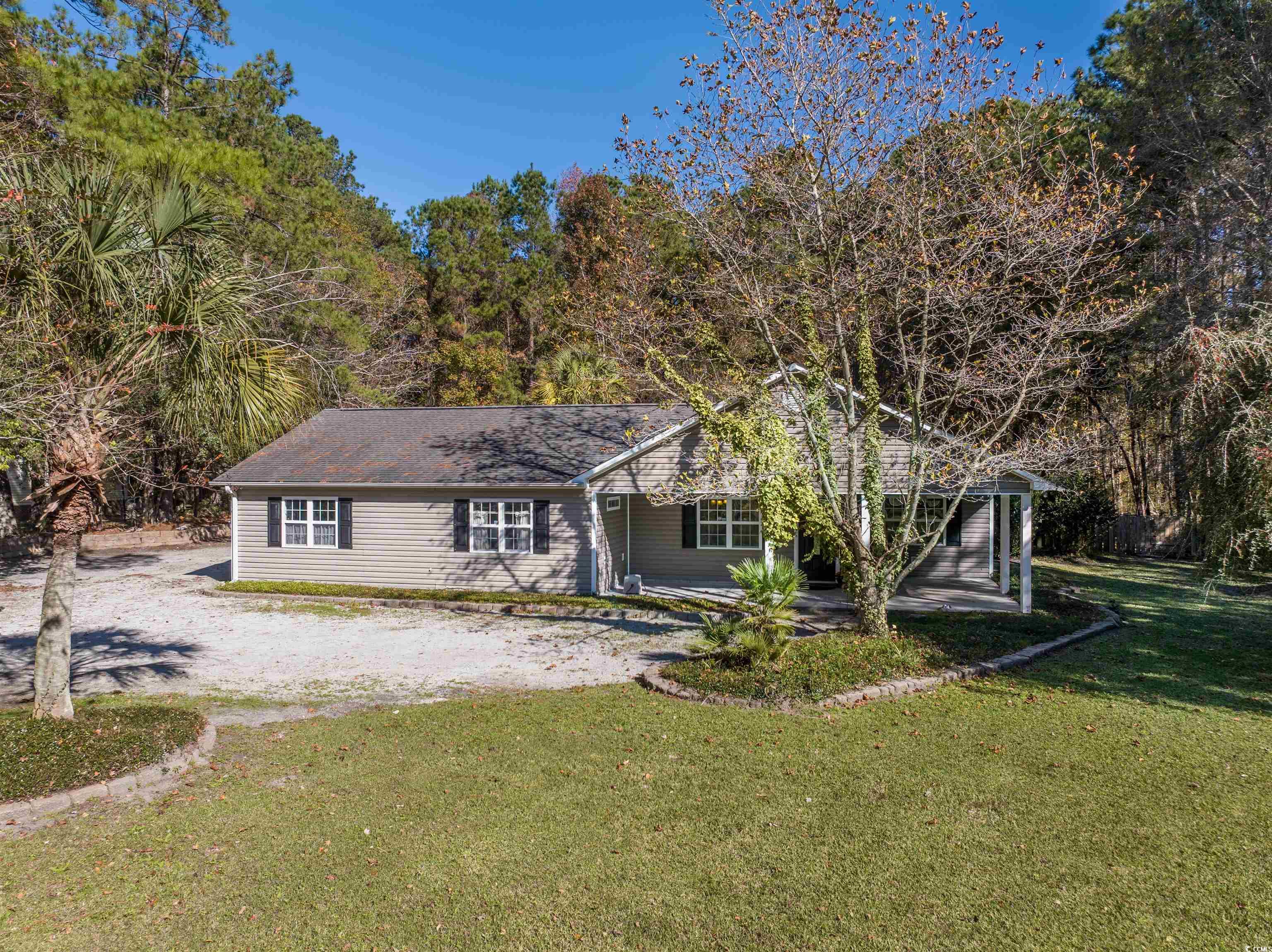 6252 Salem Road Myrtle Beach, SC 29588 - Photo 4 of 39 View of front facade with a front lawn