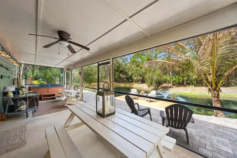 a view of a patio with swimming pool
