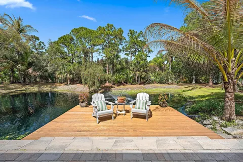 a view of a lake with a house