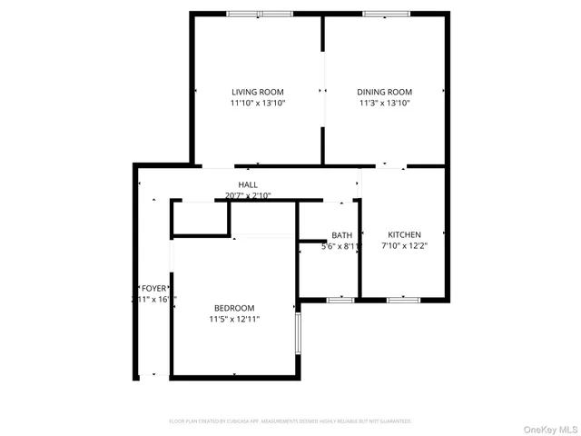 a picture of a bench in front of a wall