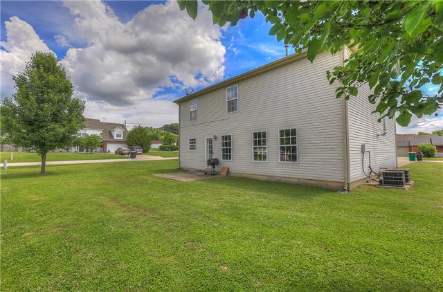 2148 Spring Hill Circle Spring Hill, TN 37174 - Photo 2 of 18 A view of the back of the home located on a large corner lot.