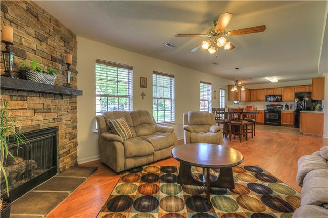 2148 Spring Hill Circle Spring Hill, TN 37174 - Photo 11 of 18 View from the den to the dining area and kitchen.