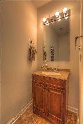 2148 Spring Hill Circle Spring Hill, TN 37174 - Photo 12 of 18 Half bath with NEW vanity w/granite countertop & NEW tile floor....